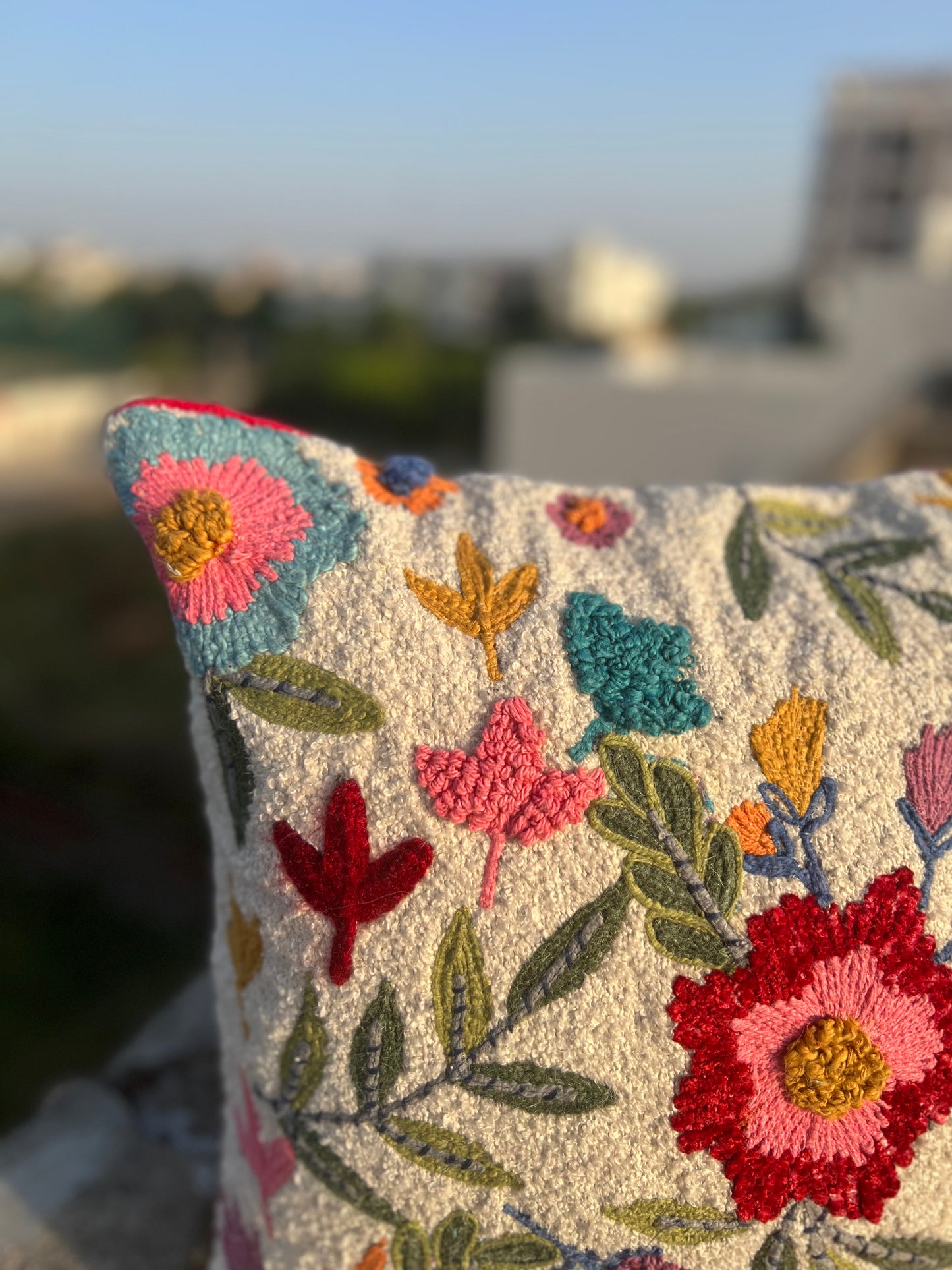 Colorful embroidered cushion cover