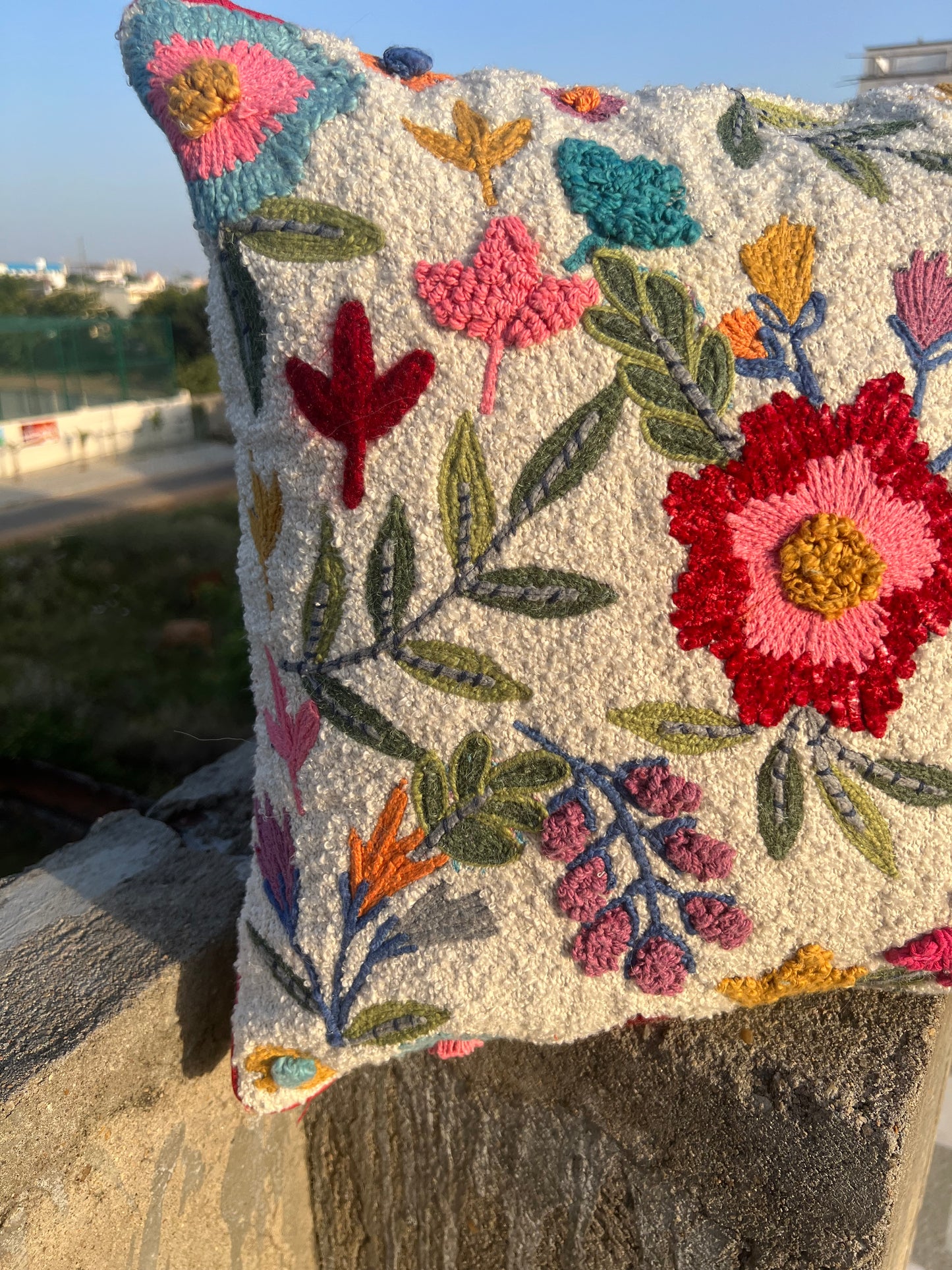 Colorful embroidered cushion cover