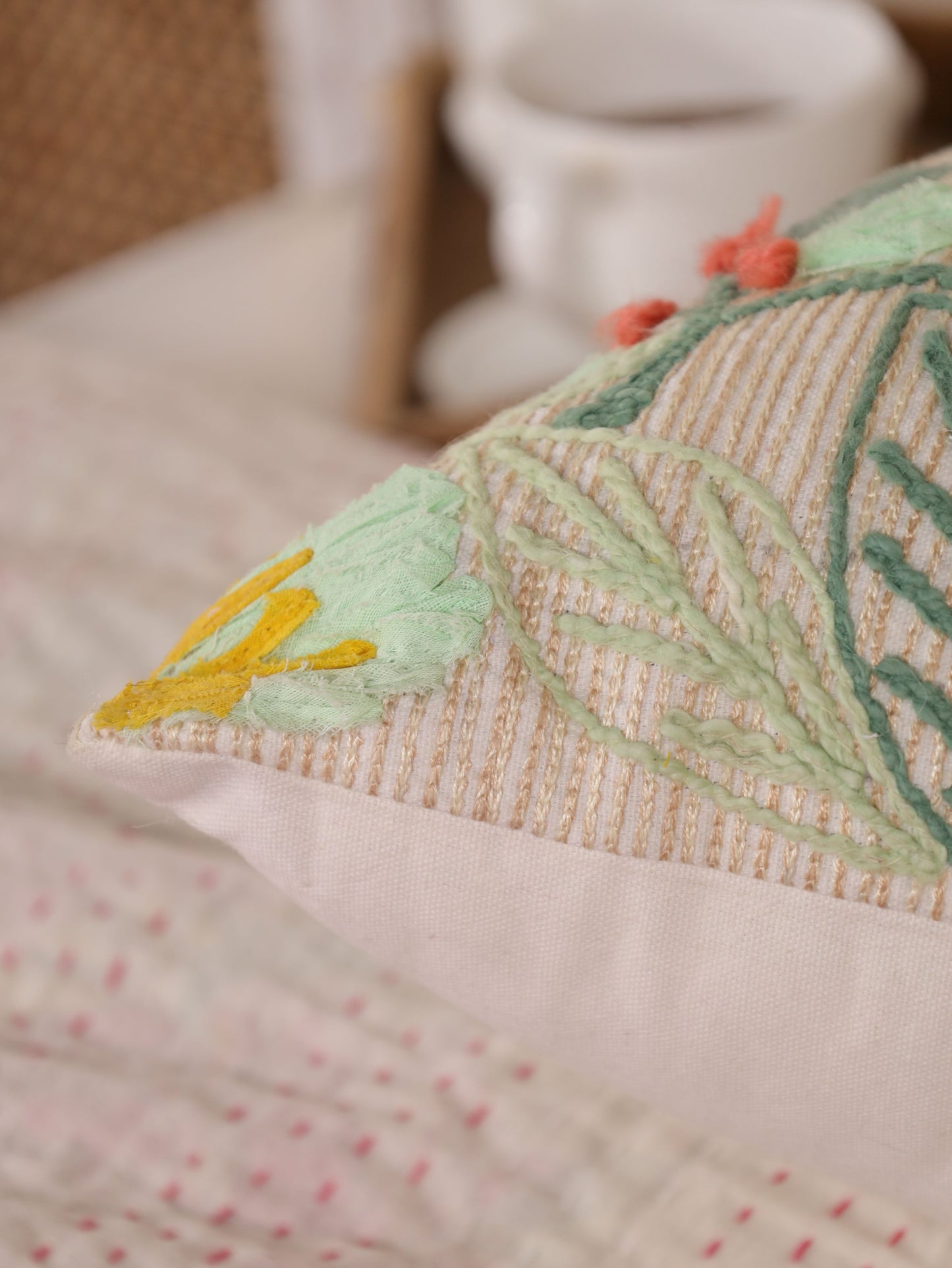 Floral embroidered cushion cover